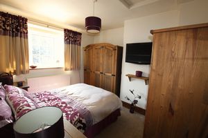 Bedroom One- click for photo gallery